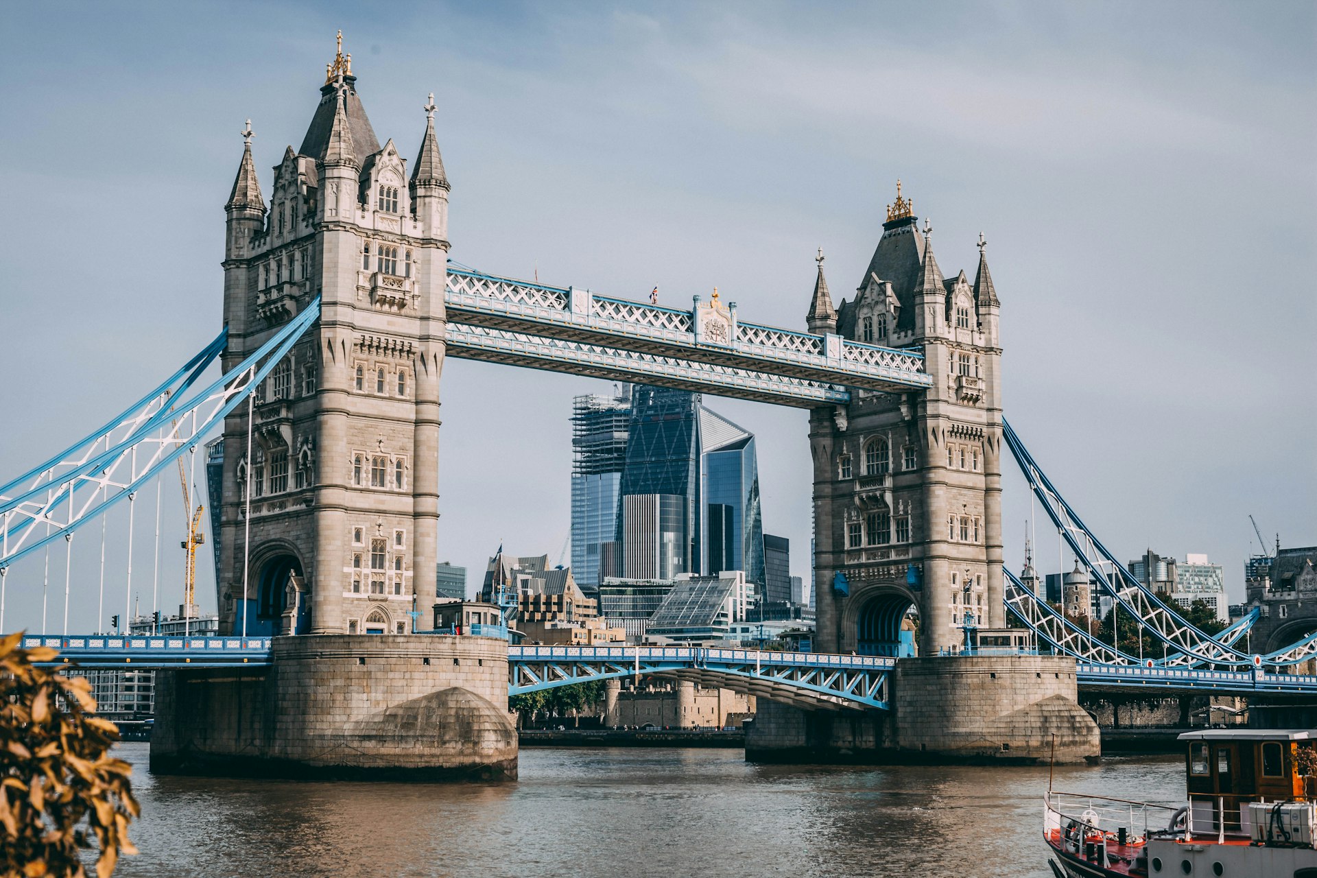 London skyline at twilight reflecting on the Thames River, iconic British architecture