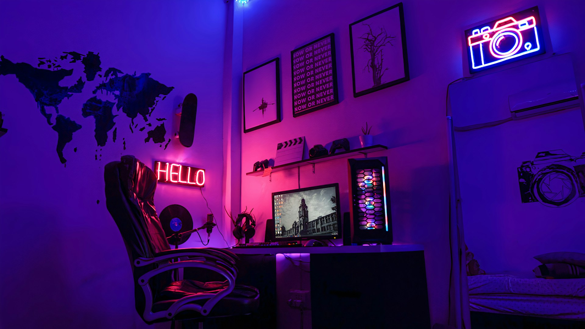 Gaming setup with dual monitors and microphone in dark room