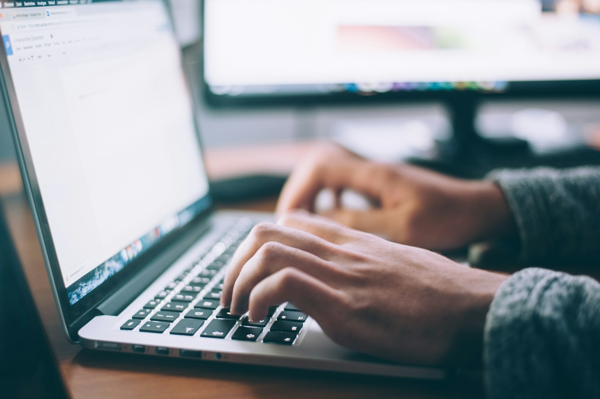 Professional workspace with laptop and business tools