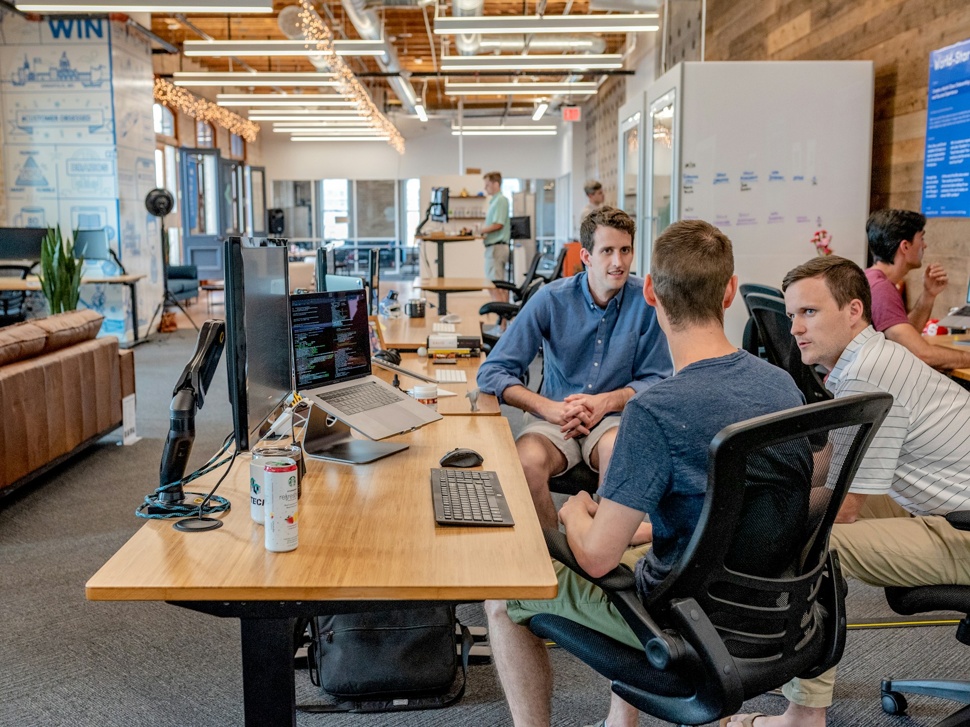 Team collaboration and strategy session in modern workplace