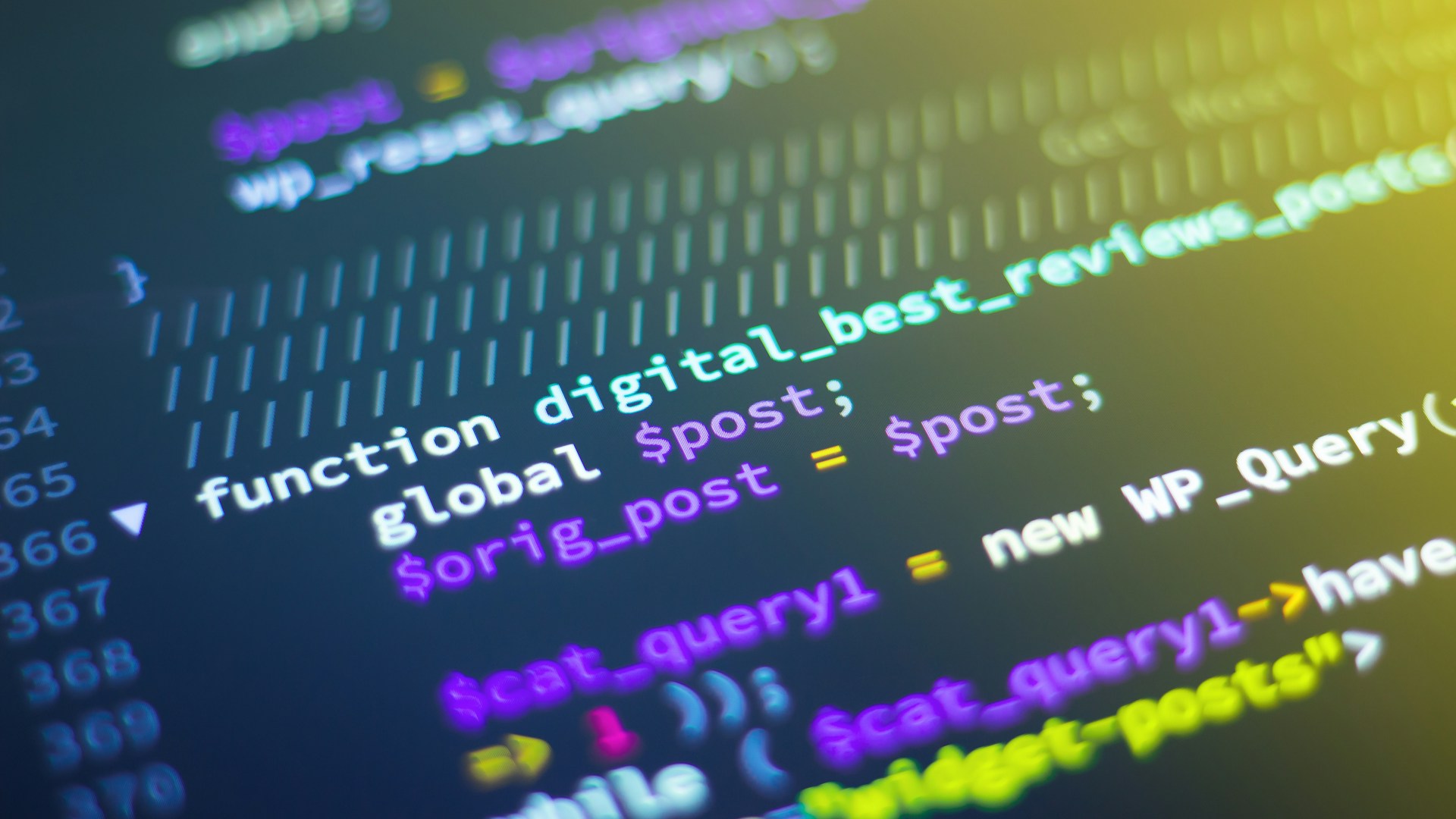 Computer screen showing code and digital data in a dark environment