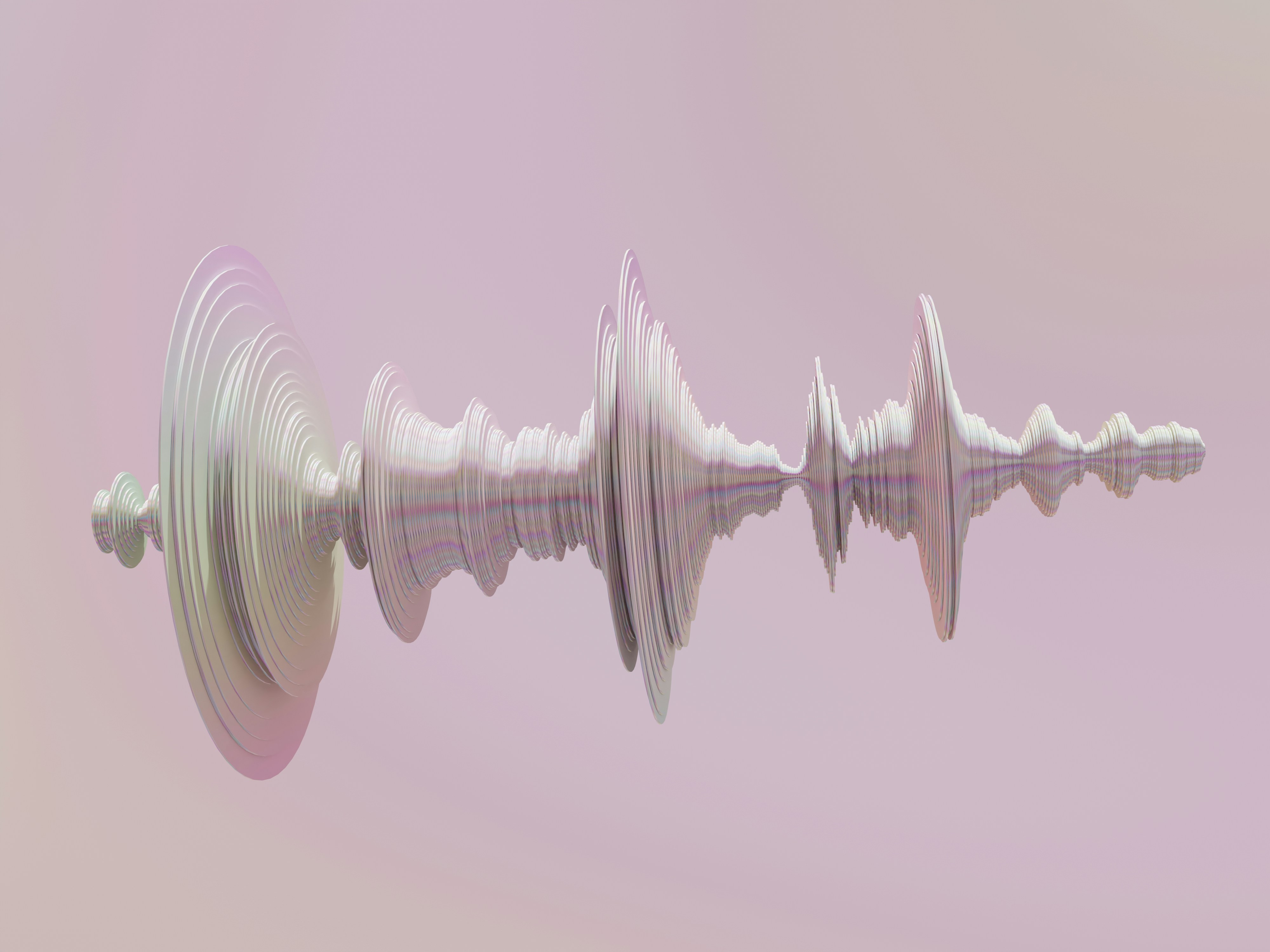 Sound wave visualization on a pink background representing audio and music