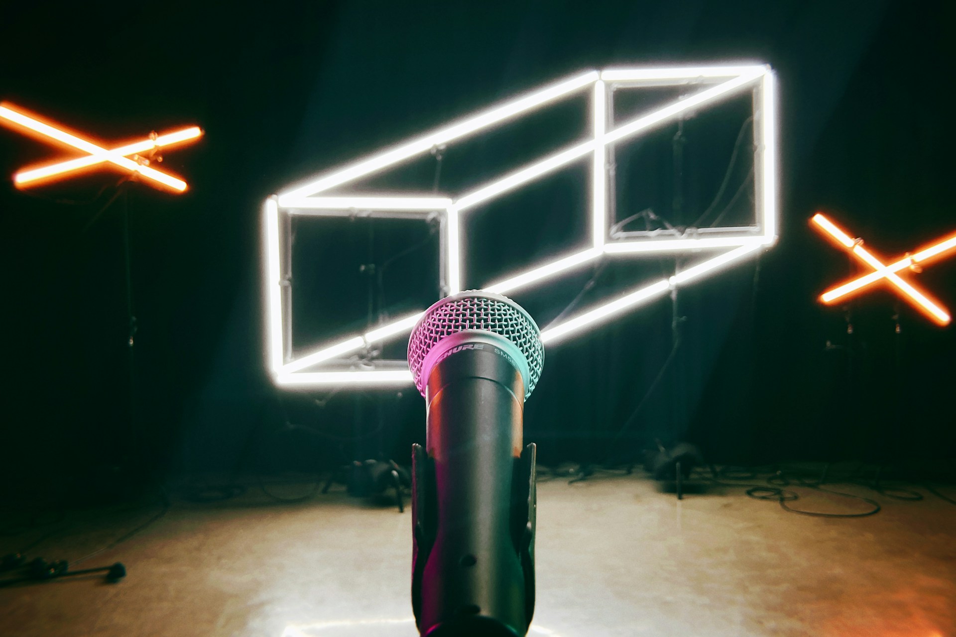 Professional recording studio microphone setup in atmospheric dark lighting